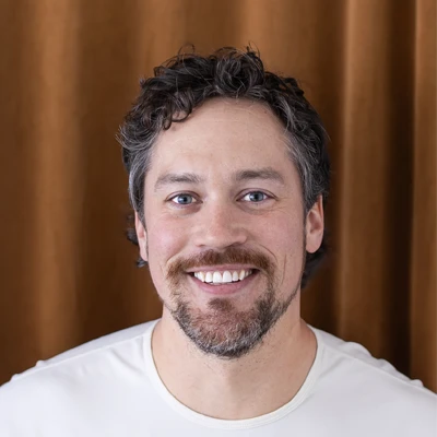 A headshot photo of Dr. Drew White